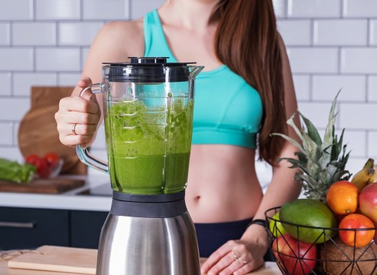 blender green smoothie woman healthy fruit